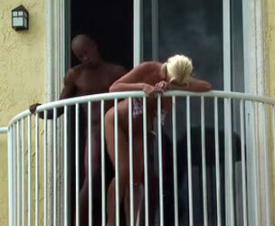caught an bi-racial duo on the balcony