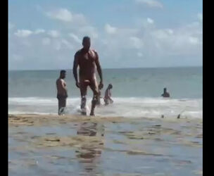Nude fellow with indeed monster huge man meat ambling beach