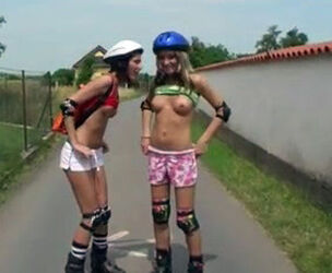 bare teenage stunners rail on rollers in the park, wild